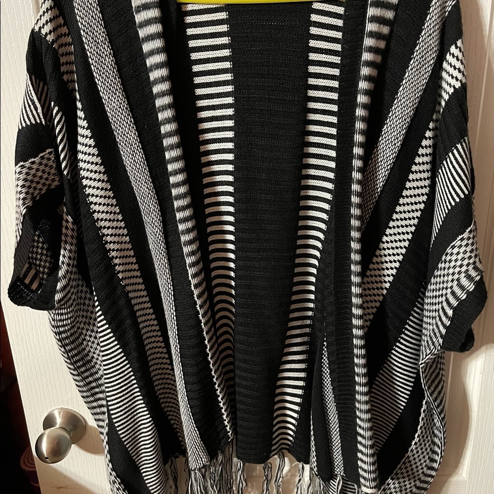 CATO Black and White short sleeve sweater vest.